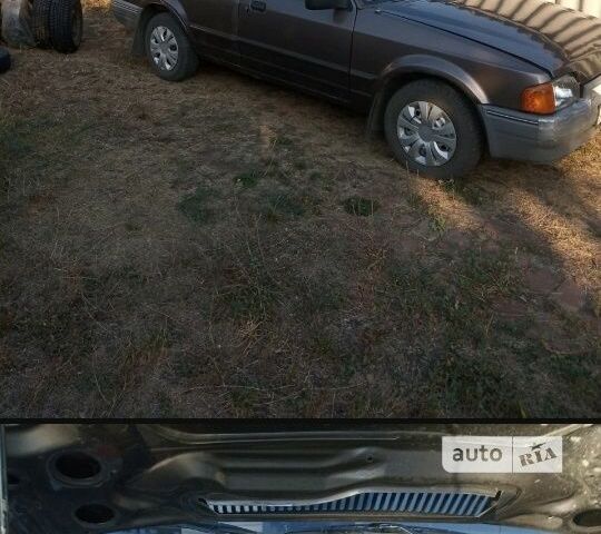 Коричневый Форд Эскорт, объемом двигателя 1.4 л и пробегом 100 тыс. км за 800 $, фото 8 на Automoto.ua