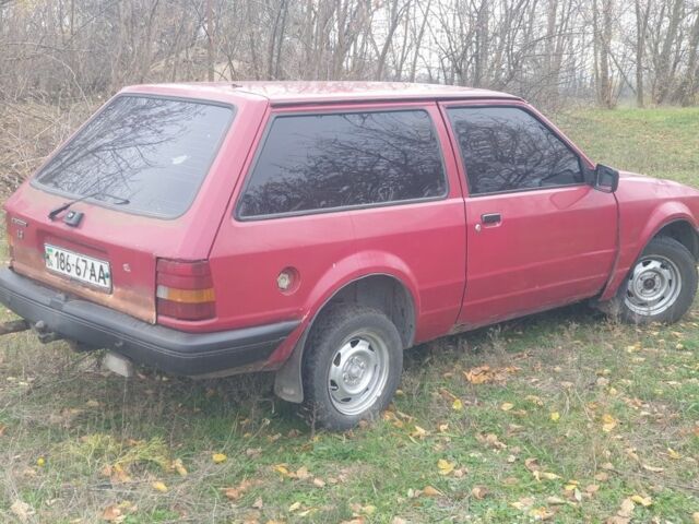 Красный Форд Эскорт, объемом двигателя 1.3 л и пробегом 165 тыс. км за 550 $, фото 4 на Automoto.ua