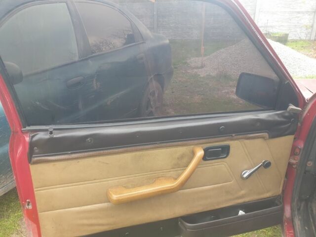 Красный Форд Эскорт, объемом двигателя 1.3 л и пробегом 165 тыс. км за 550 $, фото 8 на Automoto.ua