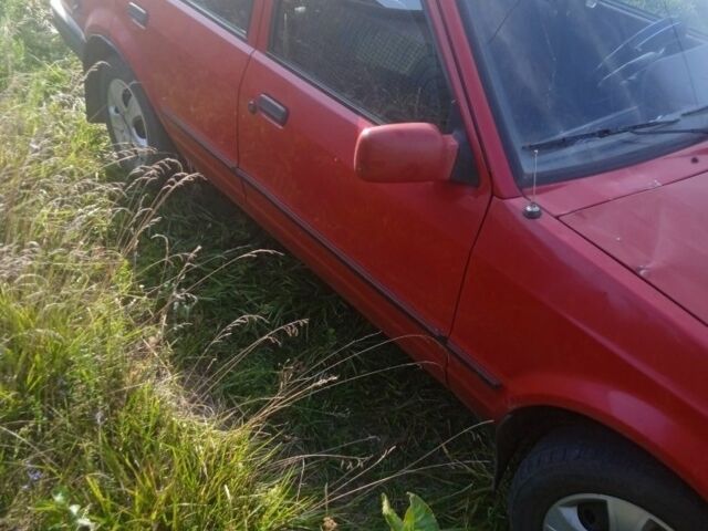 Красный Форд Эскорт, объемом двигателя 1.3 л и пробегом 300 тыс. км за 1000 $, фото 2 на Automoto.ua