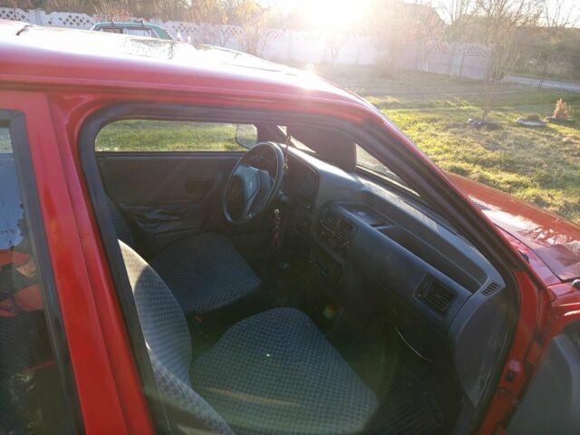 Червоний Форд Ескорт, об'ємом двигуна 1.4 л та пробігом 333 тис. км за 700 $, фото 6 на Automoto.ua