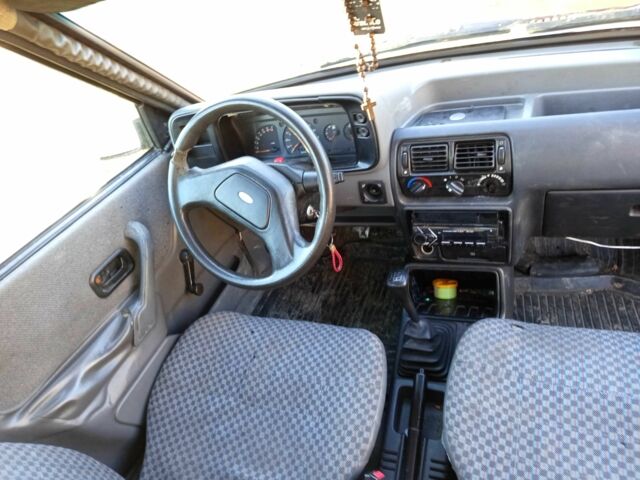 Червоний Форд Ескорт, об'ємом двигуна 1.4 л та пробігом 333 тис. км за 700 $, фото 5 на Automoto.ua