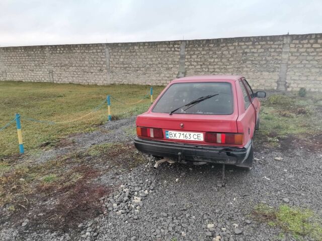 Красный Форд Эскорт, объемом двигателя 1.4 л и пробегом 300 тыс. км за 650 $, фото 2 на Automoto.ua