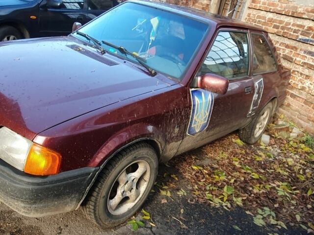 Красный Форд Эскорт, объемом двигателя 1.4 л и пробегом 400 тыс. км за 1300 $, фото 5 на Automoto.ua