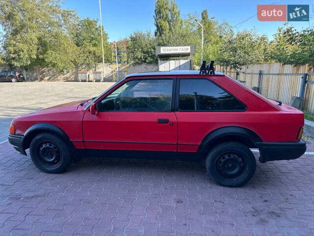 Красный Форд Эскорт, объемом двигателя 1.4 л и пробегом 240 тыс. км за 977 $, фото 15 на Automoto.ua
