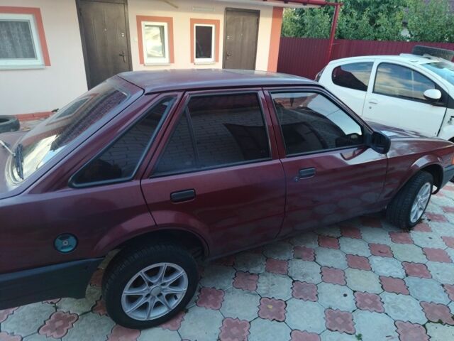 Червоний Форд Ескорт, об'ємом двигуна 1.4 л та пробігом 230 тис. км за 900 $, фото 3 на Automoto.ua