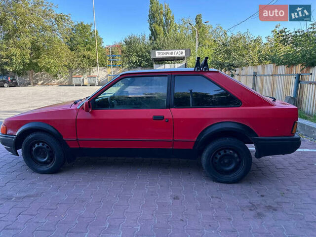 Красный Форд Эскорт, объемом двигателя 1.4 л и пробегом 240 тыс. км за 977 $, фото 14 на Automoto.ua