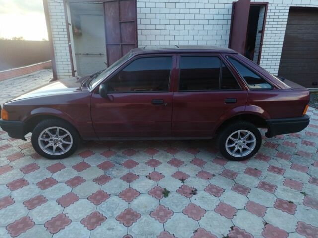 Червоний Форд Ескорт, об'ємом двигуна 1.4 л та пробігом 230 тис. км за 900 $, фото 1 на Automoto.ua