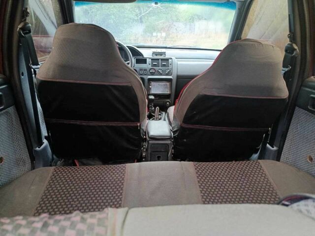 Красный Форд Эскорт, объемом двигателя 1.4 л и пробегом 300 тыс. км за 950 $, фото 7 на Automoto.ua