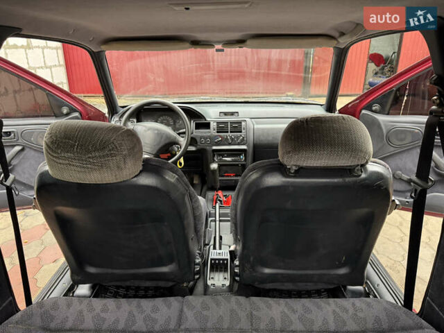 Красный Форд Эскорт, объемом двигателя 1.8 л и пробегом 55 тыс. км за 1500 $, фото 19 на Automoto.ua