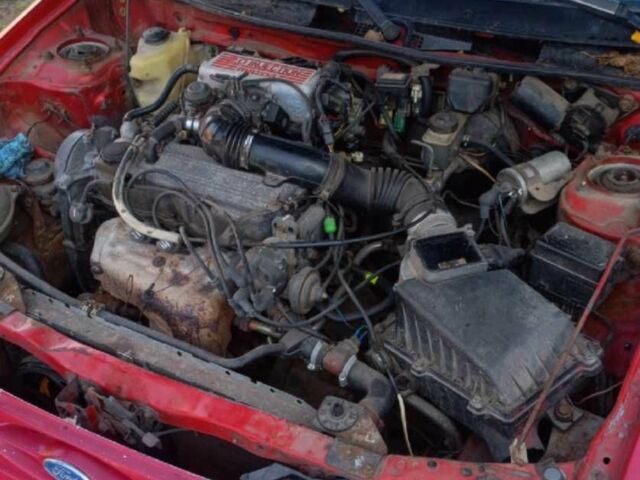 Красный Форд Эскорт, объемом двигателя 2 л и пробегом 61 тыс. км за 700 $, фото 1 на Automoto.ua