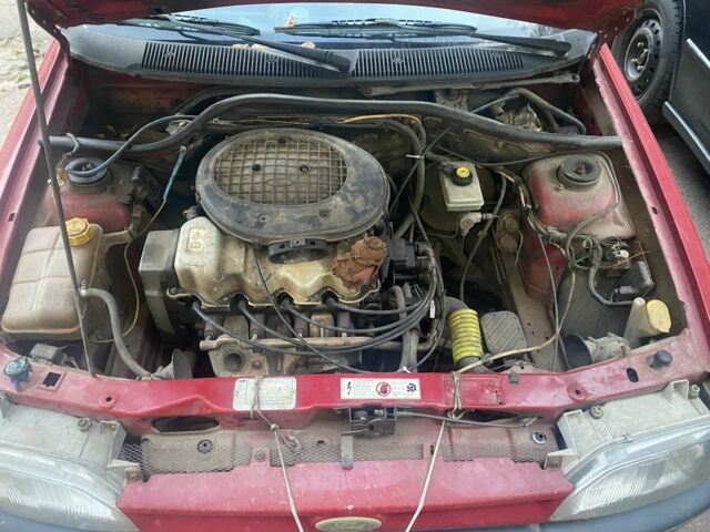 Красный Форд Эскорт, объемом двигателя 1.4 л и пробегом 500 тыс. км за 362 $, фото 6 на Automoto.ua