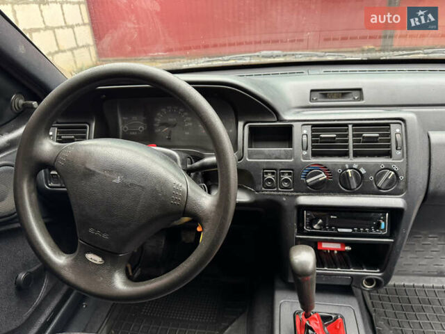 Красный Форд Эскорт, объемом двигателя 1.8 л и пробегом 55 тыс. км за 1500 $, фото 11 на Automoto.ua