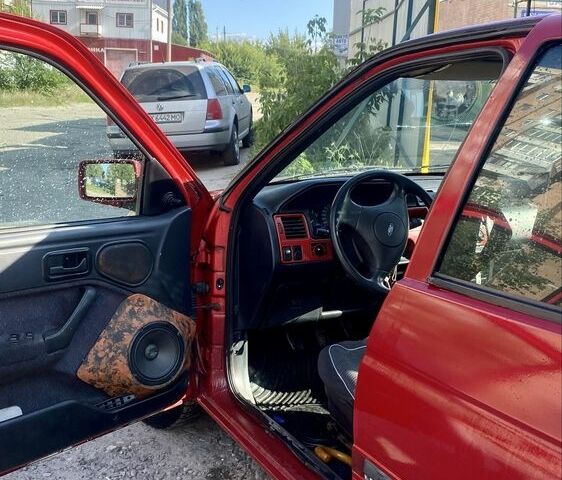 Красный Форд Эскорт, объемом двигателя 1.6 л и пробегом 165 тыс. км за 1500 $, фото 1 на Automoto.ua