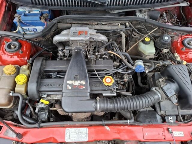 Красный Форд Эскорт, объемом двигателя 1.8 л и пробегом 100 тыс. км за 998 $, фото 7 на Automoto.ua