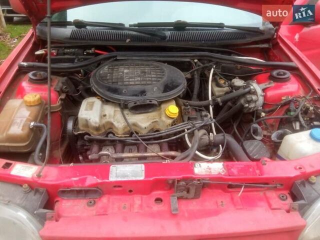 Красный Форд Эскорт, объемом двигателя 1.4 л и пробегом 233 тыс. км за 750 $, фото 13 на Automoto.ua