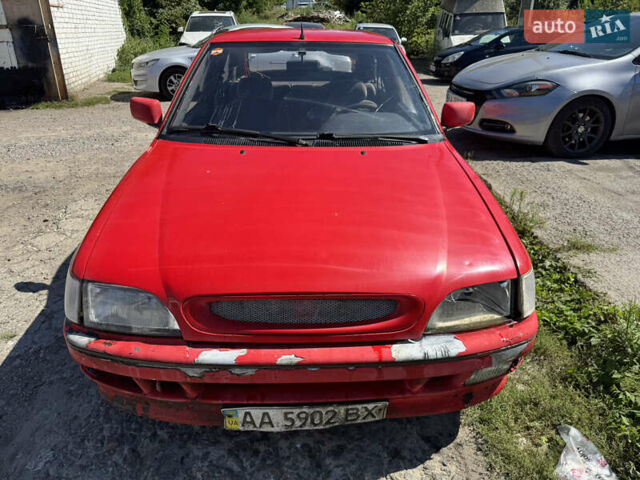 Красный Форд Эскорт, объемом двигателя 1.3 л и пробегом 100 тыс. км за 600 $, фото 4 на Automoto.ua