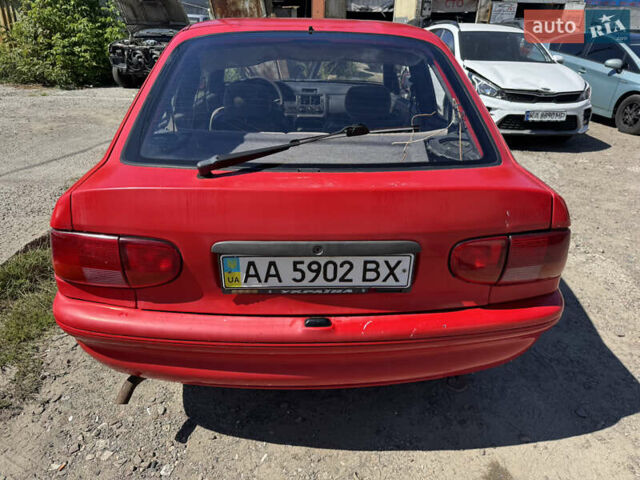Красный Форд Эскорт, объемом двигателя 1.3 л и пробегом 100 тыс. км за 600 $, фото 1 на Automoto.ua