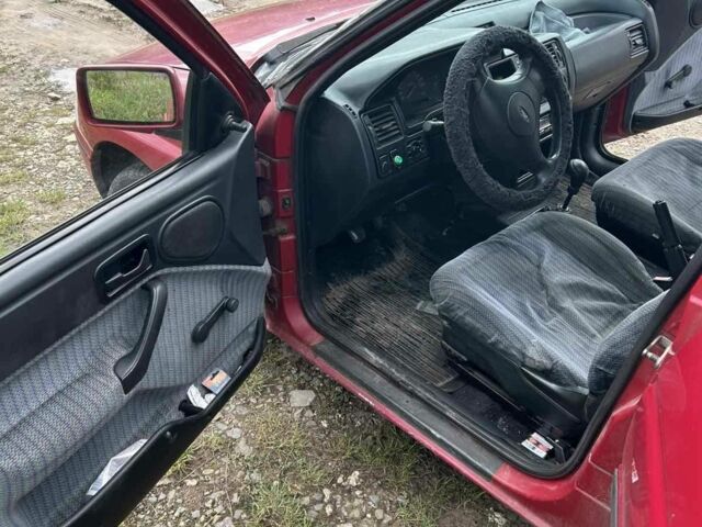 Красный Форд Эскорт, объемом двигателя 1.6 л и пробегом 230 тыс. км за 1400 $, фото 6 на Automoto.ua