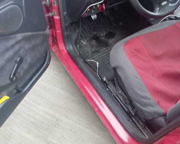 Красный Форд Эскорт, объемом двигателя 1.39 л и пробегом 997 тыс. км за 1333 $, фото 2 на Automoto.ua