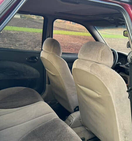 Червоний Форд Ескорт, об'ємом двигуна 1.4 л та пробігом 305 тис. км за 1200 $, фото 7 на Automoto.ua