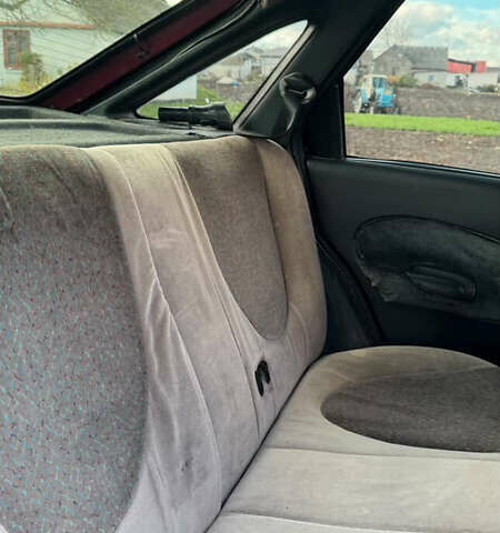 Червоний Форд Ескорт, об'ємом двигуна 1.4 л та пробігом 305 тис. км за 1200 $, фото 6 на Automoto.ua