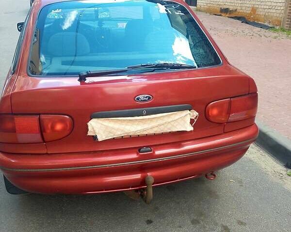 Красный Форд Эскорт, объемом двигателя 1.4 л и пробегом 120 тыс. км за 1900 $, фото 1 на Automoto.ua