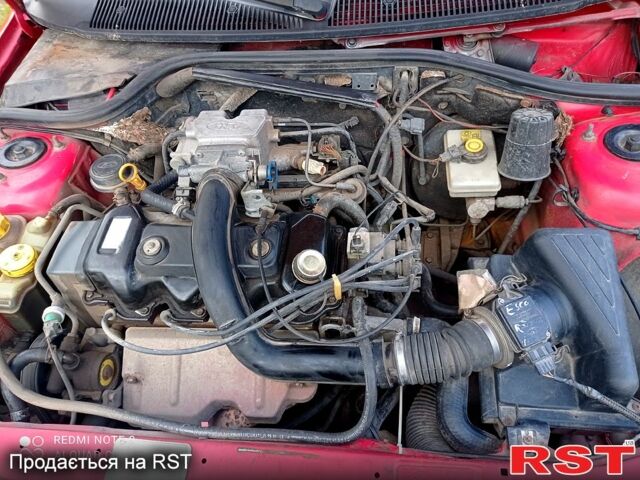Красный Форд Эскорт, объемом двигателя 1.4 л и пробегом 1 тыс. км за 1800 $, фото 7 на Automoto.ua
