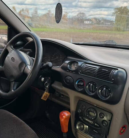 Червоний Форд Ескорт, об'ємом двигуна 1.4 л та пробігом 305 тис. км за 1200 $, фото 8 на Automoto.ua