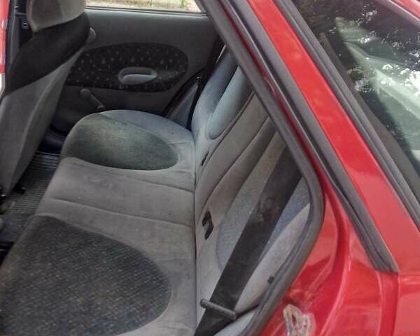 Красный Форд Эскорт, объемом двигателя 1.4 л и пробегом 120 тыс. км за 1900 $, фото 8 на Automoto.ua