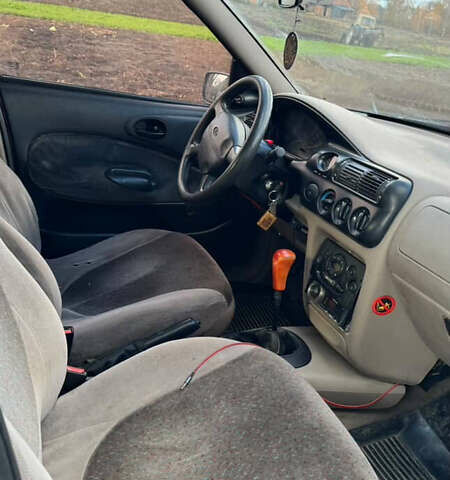 Червоний Форд Ескорт, об'ємом двигуна 1.4 л та пробігом 305 тис. км за 1200 $, фото 4 на Automoto.ua