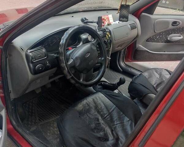 Красный Форд Эскорт, объемом двигателя 1.4 л и пробегом 120 тыс. км за 1900 $, фото 7 на Automoto.ua