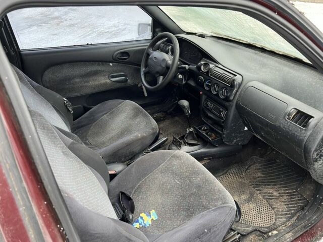 Красный Форд Эскорт, объемом двигателя 1.3 л и пробегом 222 тыс. км за 800 $, фото 5 на Automoto.ua