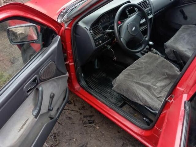 Красный Форд Эскорт, объемом двигателя 1.4 л и пробегом 100 тыс. км за 400 $, фото 7 на Automoto.ua