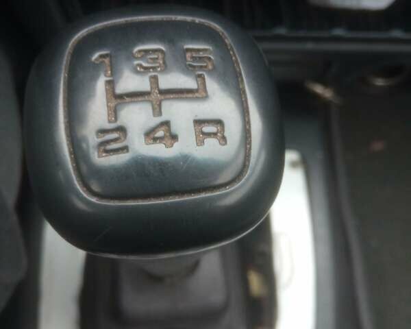 Красный Форд Эскорт, объемом двигателя 1.4 л и пробегом 233 тыс. км за 799 $, фото 1 на Automoto.ua