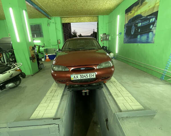 Красный Форд Эскорт, объемом двигателя 2 л и пробегом 216 тыс. км за 2500 $, фото 22 на Automoto.ua