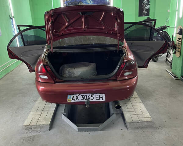 Красный Форд Эскорт, объемом двигателя 2 л и пробегом 216 тыс. км за 2500 $, фото 28 на Automoto.ua