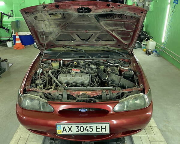 Красный Форд Эскорт, объемом двигателя 2 л и пробегом 216 тыс. км за 2500 $, фото 14 на Automoto.ua