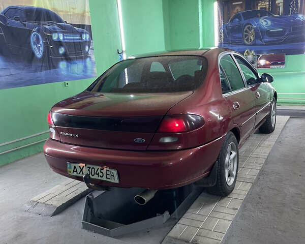 Красный Форд Эскорт, объемом двигателя 2 л и пробегом 216 тыс. км за 2500 $, фото 3 на Automoto.ua