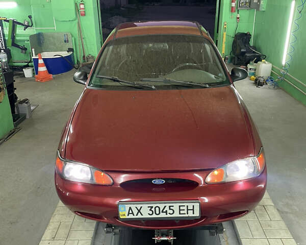 Красный Форд Эскорт, объемом двигателя 2 л и пробегом 216 тыс. км за 2500 $, фото 5 на Automoto.ua