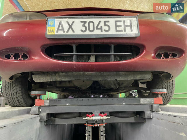 Красный Форд Эскорт, объемом двигателя 2 л и пробегом 216 тыс. км за 2500 $, фото 18 на Automoto.ua