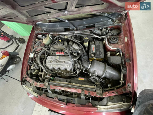 Красный Форд Эскорт, объемом двигателя 2 л и пробегом 216 тыс. км за 2500 $, фото 12 на Automoto.ua