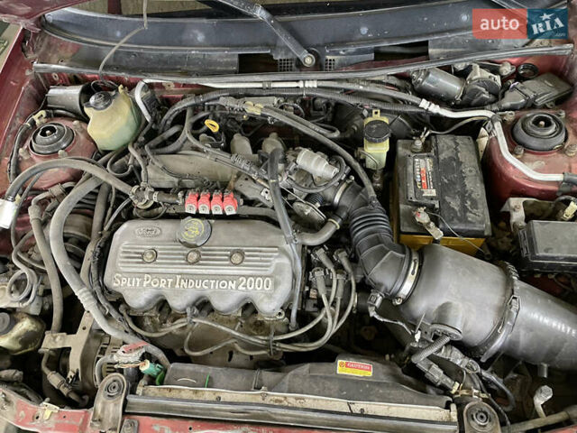 Красный Форд Эскорт, объемом двигателя 2 л и пробегом 216 тыс. км за 2500 $, фото 10 на Automoto.ua