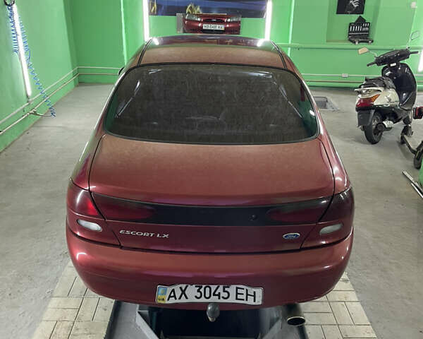 Красный Форд Эскорт, объемом двигателя 2 л и пробегом 216 тыс. км за 2500 $, фото 25 на Automoto.ua