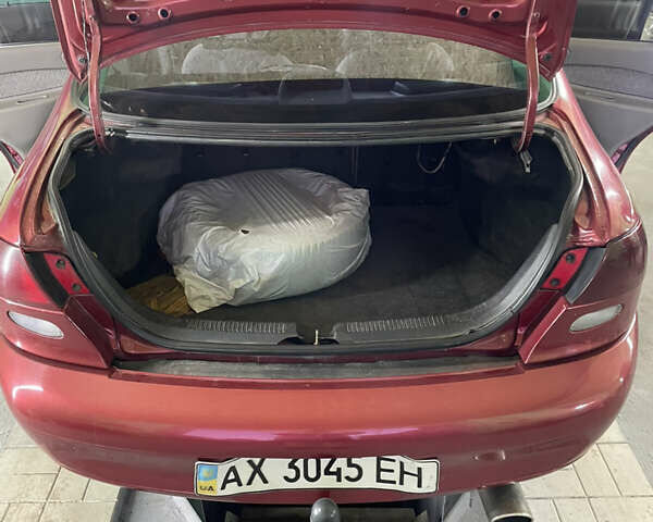 Красный Форд Эскорт, объемом двигателя 2 л и пробегом 216 тыс. км за 2500 $, фото 42 на Automoto.ua