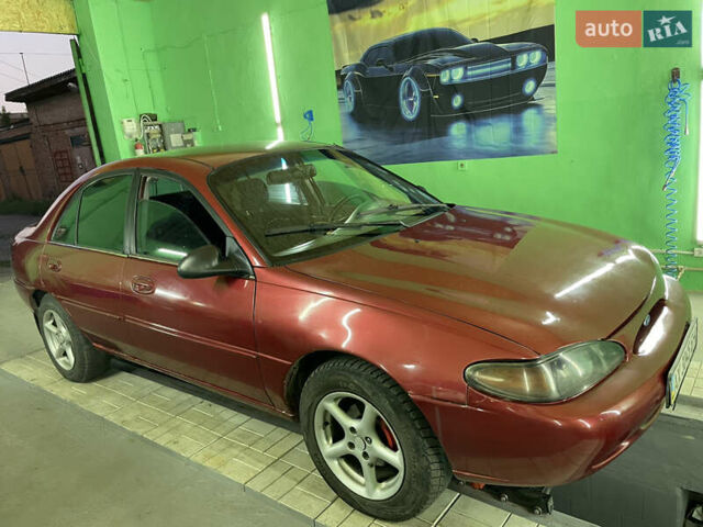 Красный Форд Эскорт, объемом двигателя 2 л и пробегом 216 тыс. км за 2500 $, фото 24 на Automoto.ua