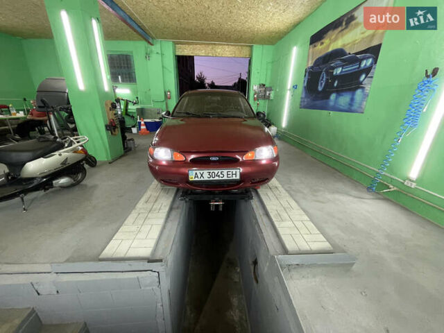 Красный Форд Эскорт, объемом двигателя 2 л и пробегом 216 тыс. км за 2500 $, фото 7 на Automoto.ua