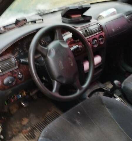 Червоний Форд Ескорт, об'ємом двигуна 1.4 л та пробігом 180 тис. км за 665 $, фото 1 на Automoto.ua