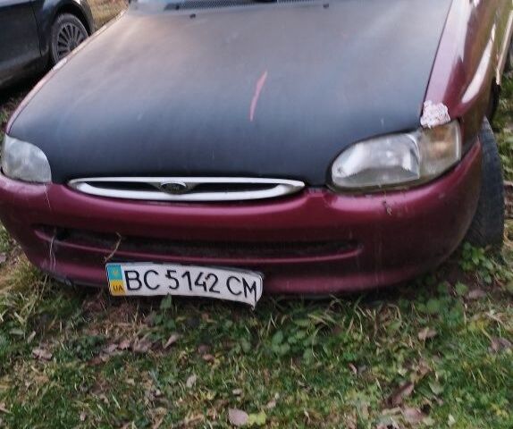Червоний Форд Ескорт, об'ємом двигуна 1.4 л та пробігом 180 тис. км за 665 $, фото 1 на Automoto.ua