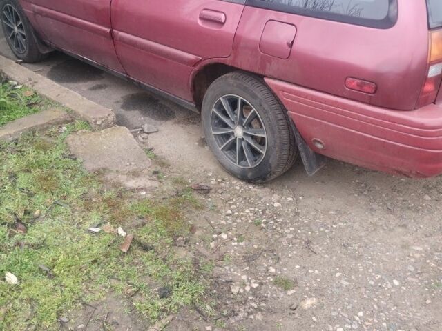 Красный Форд Эскорт, объемом двигателя 1.9 л и пробегом 190 тыс. км за 994 $, фото 1 на Automoto.ua